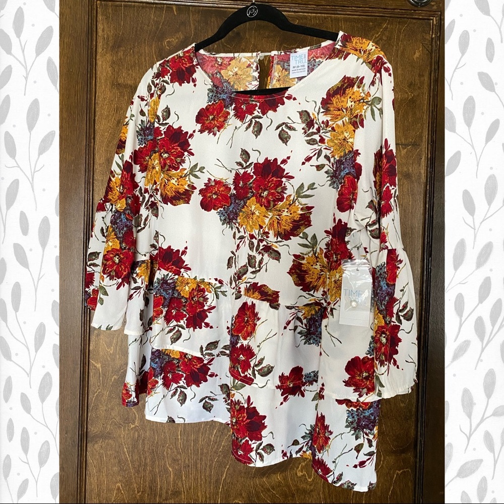 NEW Floral peplum blouse